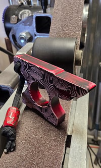 Image 1 of Red "Angry Anvil" Damascus top finish