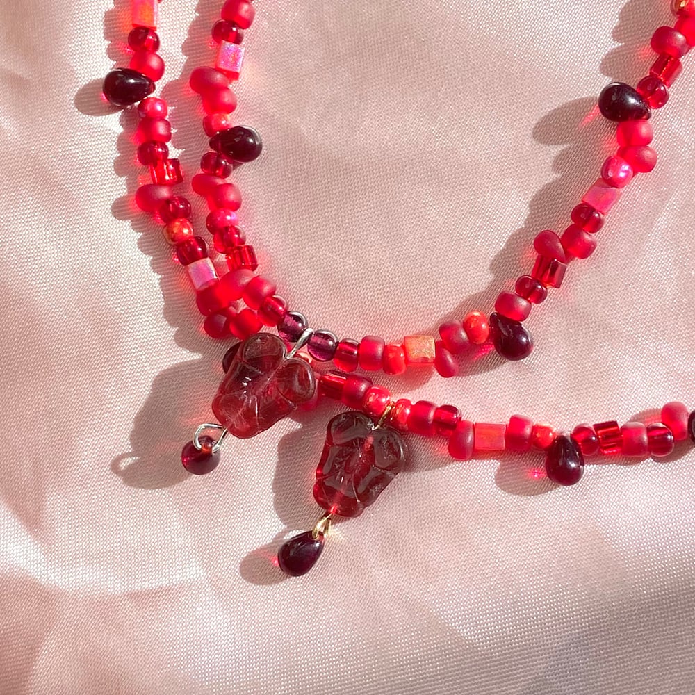 Image of bleeding-hearts flower necklace