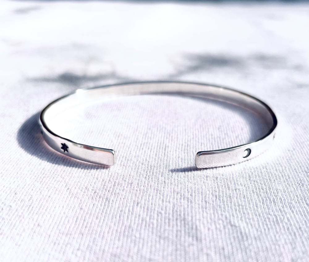 Childrens/adults sterling silver star and moon cuff bracelet (4mm wide). Celestial cuff bracelet.