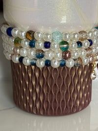Image 4 of Starlight Shimmer Moon and Stars| Cream, Navy, and Gold  Tumbler Bracelet Stack
