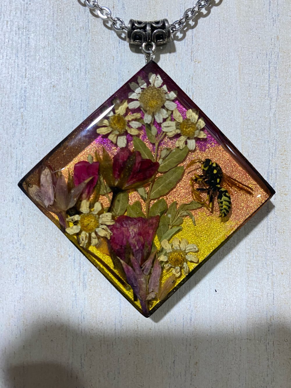 Wasp floral scene pendant 