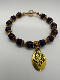 Image 2 of Purple and gold tone bracelet 