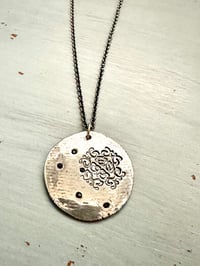 Image 12 of blue sapphire pendant with Fitzgerald quote