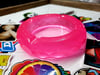 CIRCLE PINK GLOW IN THE DARK ASHTRAY