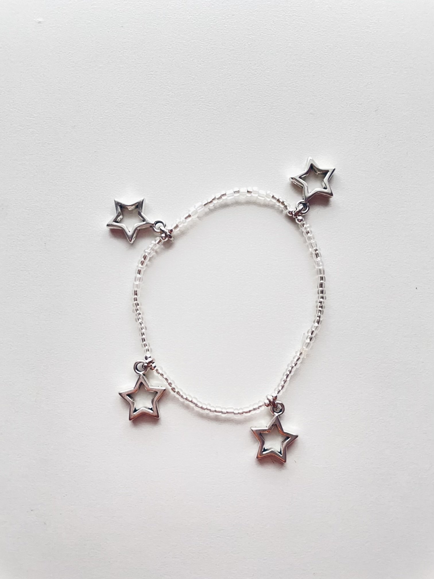 Image of clear silver star bracelet