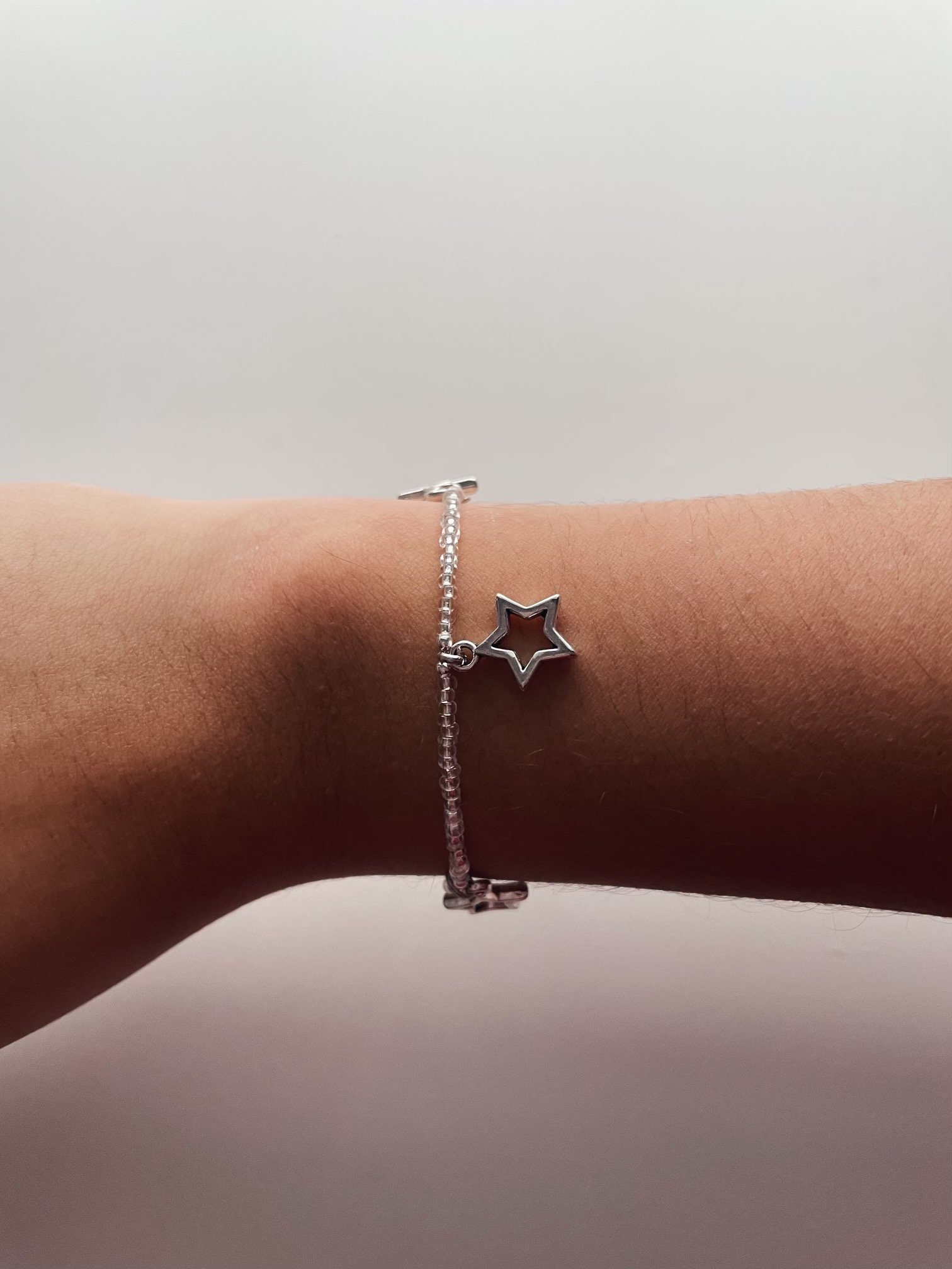 Image of clear silver star bracelet