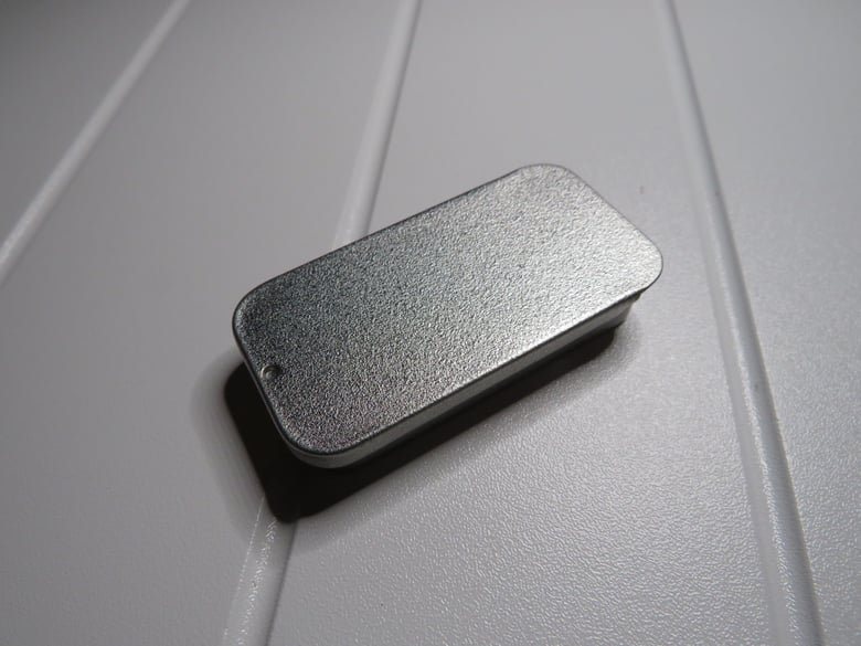 Image of S.L.T (Simple Little Tin)