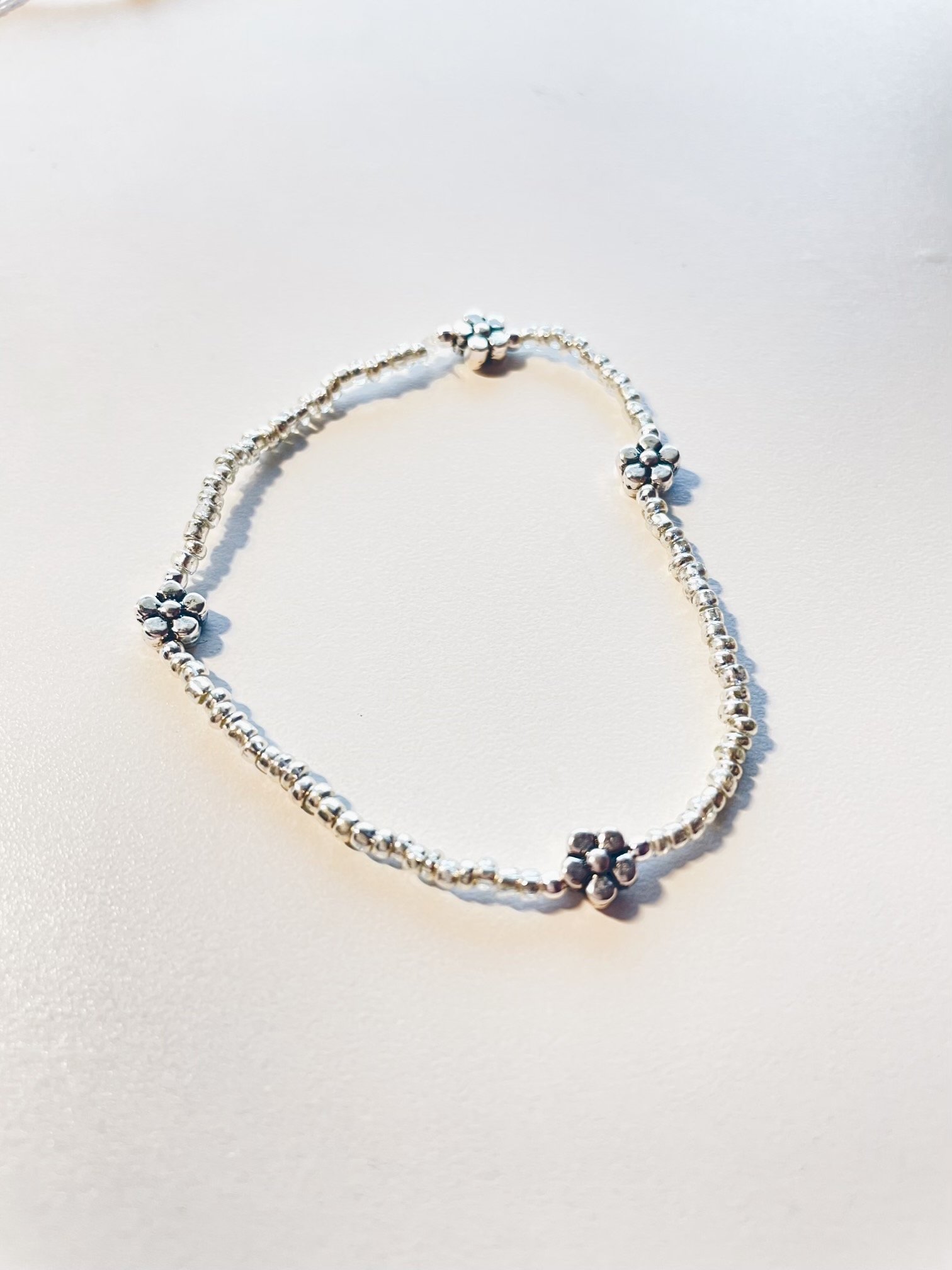 Image of silver flower bracelet