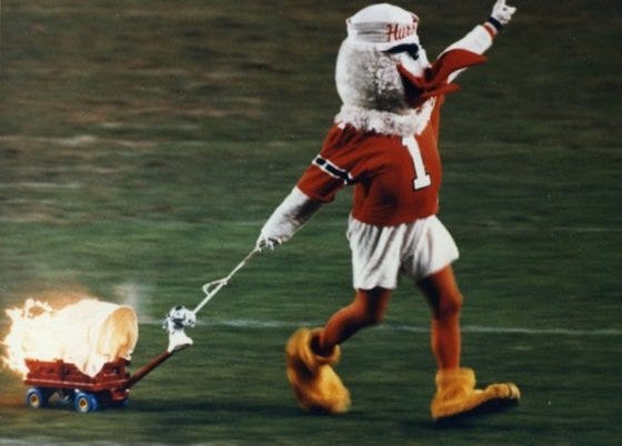 Image of Signed Sebastian the Ibis Burning Schooner Photo from 1987 National Championship Game