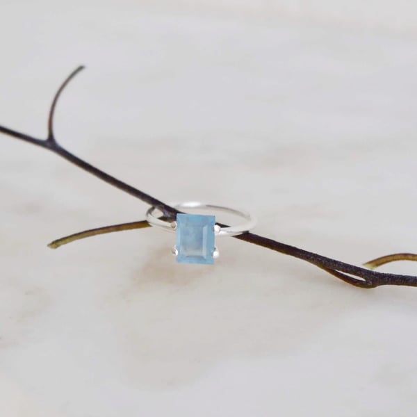 Image of Aquamarine rectangular cut 4 claws silver ring