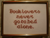Image of 'Book Lovers Never Go To Bed Alone' embroidered picture 5x7 in.