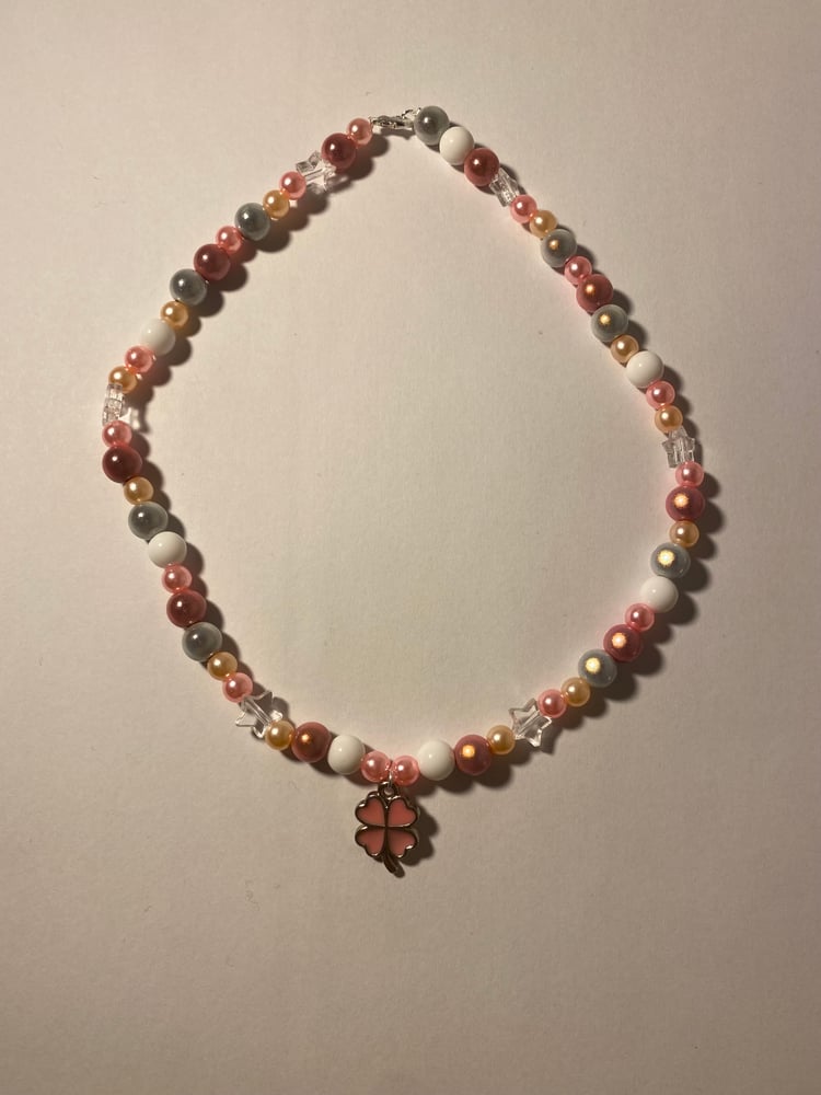 Image of peach clover necklace