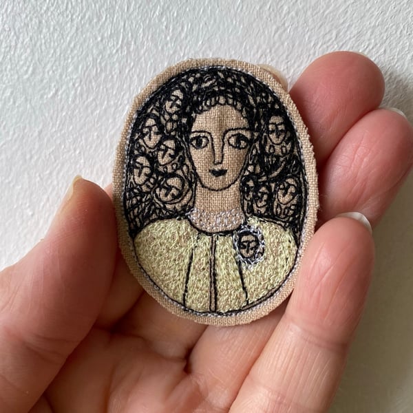 Image of smaller portrait of a woman in pale yellow - embroidery brooch 