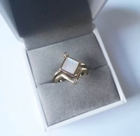 Image 1 of  The Cosmic Order Activation Ring - on ring finger 