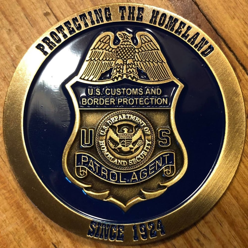 Image of CBP ~ THE HUNTING OF MAN COMMEMORATIVE COIN