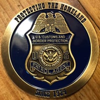 Image 1 of CBP ~ THE HUNTING OF MAN COMMEMORATIVE COIN