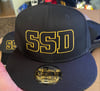 New Era 9Fifty Flat Bill SnapBack Hat  Black SSD Outline Logo 