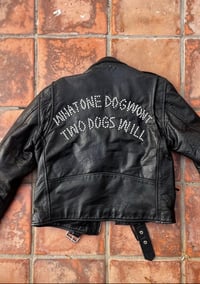 Image 1 of What one dog won’t two dogs will leather jacket 