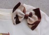 Brown Cowhide Bow