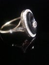 FRENCH EDWARDIAN 18CT PLATINUM ONYX AND ROSE CUT DIAMOND OVAL RING