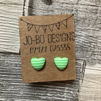 Green and white heart earrings