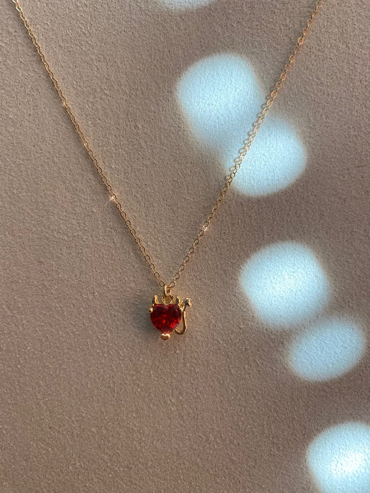 Devil deals heart necklace