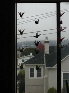Image of paper crane chain of 5
