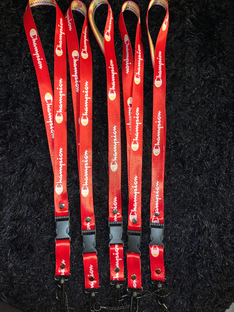 Image of Mixed Red and yellow Champion lanyards 
