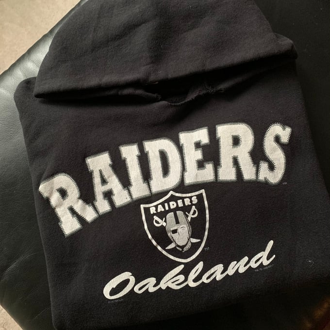 Image of VTG 1996 Nutmeg Oakland Raiders Black Hoodie