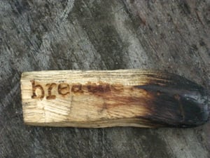 Image of laser etched palo santo wood