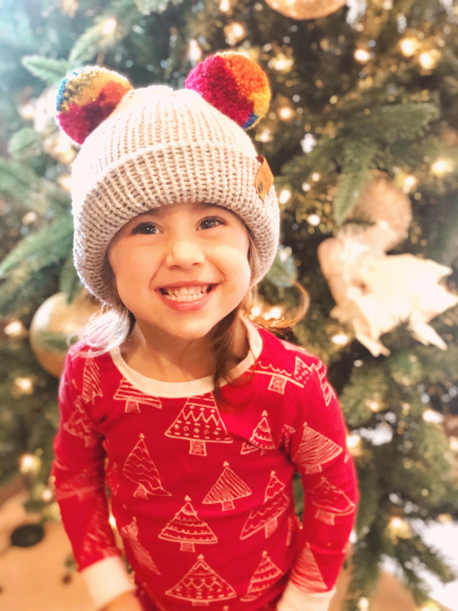 Image of Rainbow Pom Pom Beanie