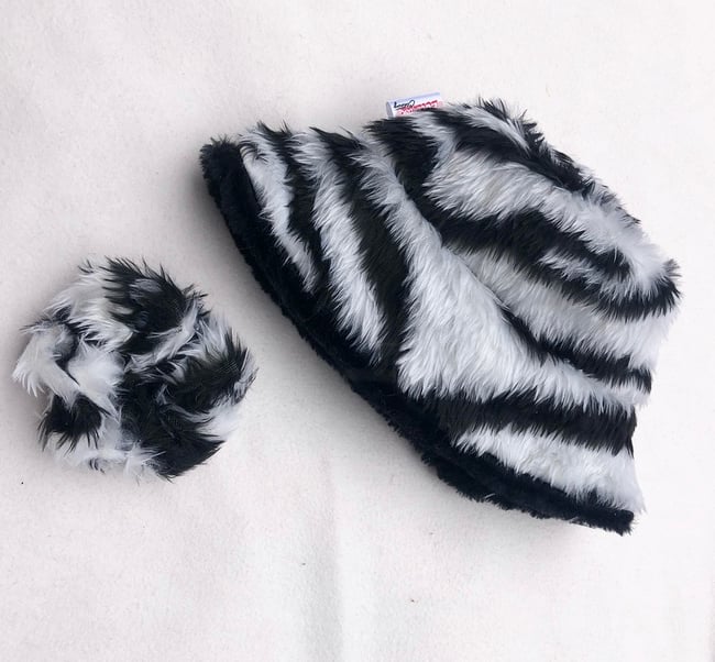 Sustainable reversible faux fur zebra bucket hat 