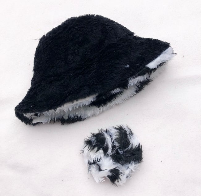 Sustainable reversible faux fur zebra bucket hat 