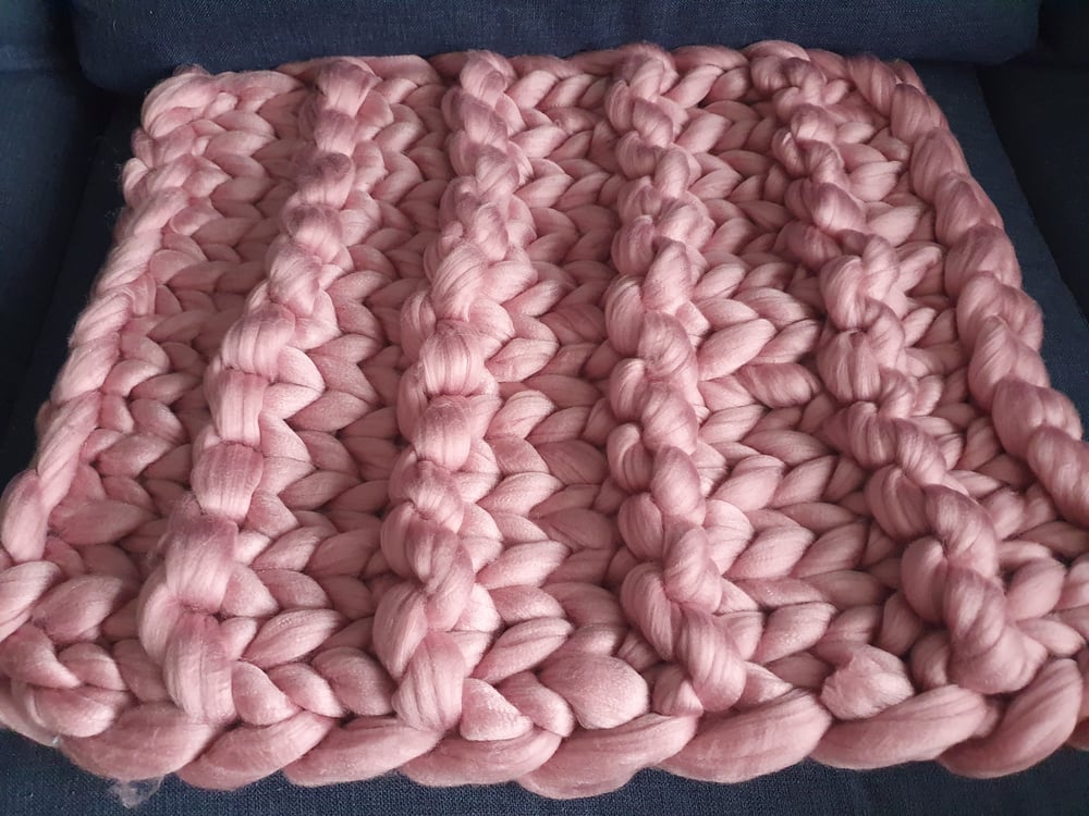 Image of Pink chunky wool baby blanket