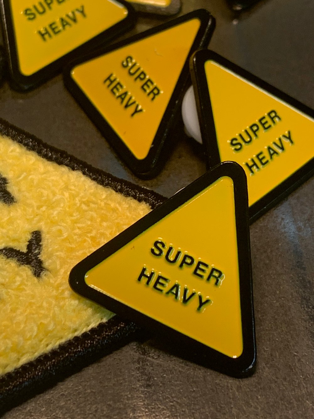 "Super Heavy" Embroidered Patches & Enamel Pins