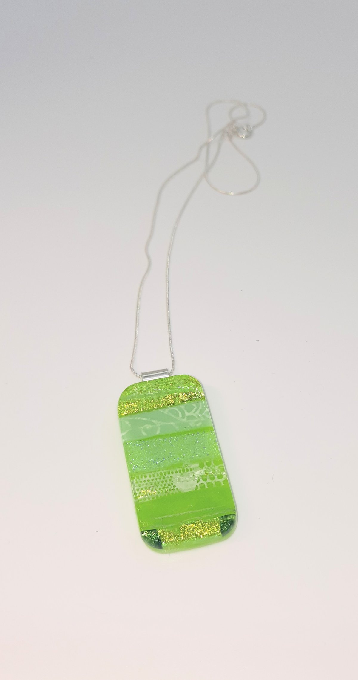Image of Medium green oblong decoupage pendant