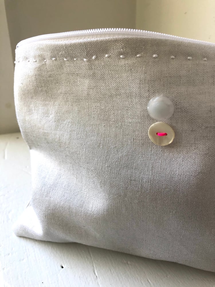 Image of silver metallic linen bag with vintage buttons