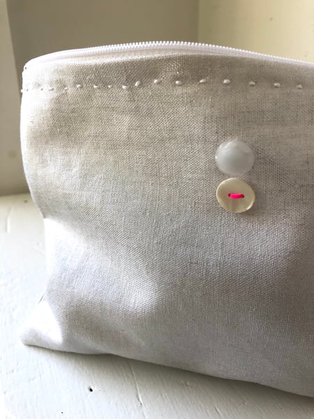 Image of silver metallic linen bag with vintage buttons