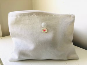 Image of silver metallic linen bag with vintage buttons