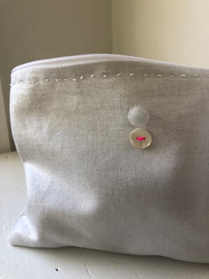 Image of silver metallic linen bag with vintage buttons