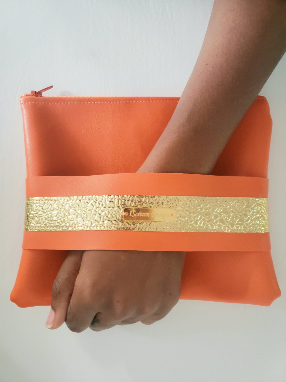 Image of Neon Orange Gold Clutch With Hand Strap