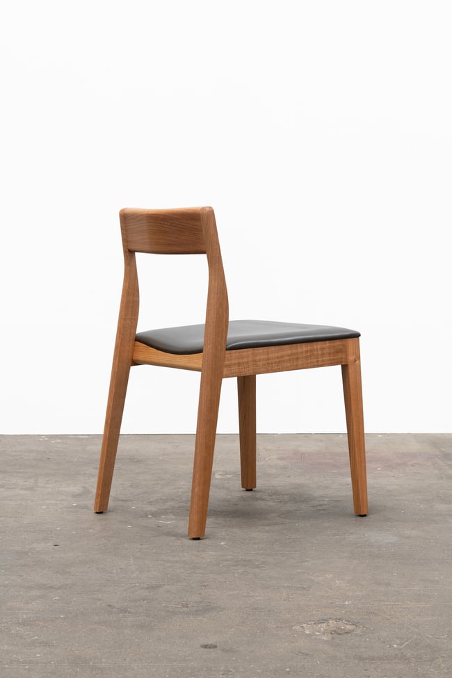 ROSE DINING CHAIR IN TASMANIAN OAK WITH AN UPHOLSTERED LEATHER SEAT