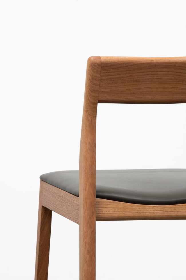 ROSE DINING CHAIR IN TASMANIAN OAK WITH AN UPHOLSTERED LEATHER SEAT