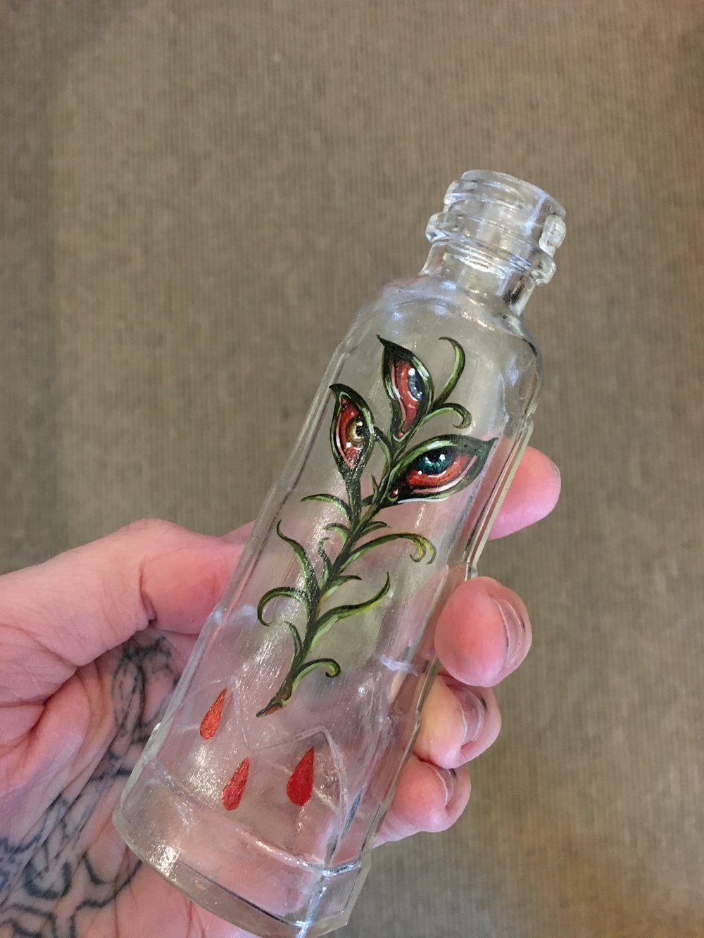 Eyeball Leaves Vintage Bottle