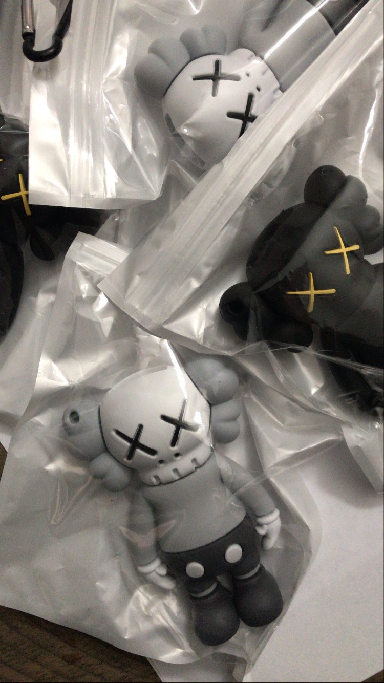 Image of kaws lighter stiizy holder