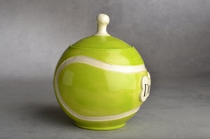 Image of Tennis Ball Dog Treat Jar Urn by Symmetrical Pottery