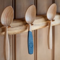 Blue eating spoon in cherry 