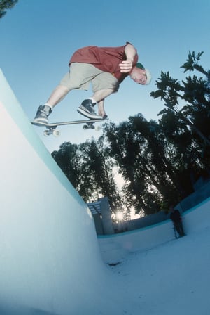 Eric Dressen, vertical wall tail tap, Skating with Natas LA 1991 by Tobin Yelland