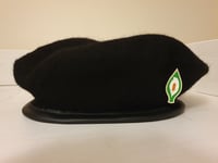 Black Beret with Easter Lily Pin Badge.