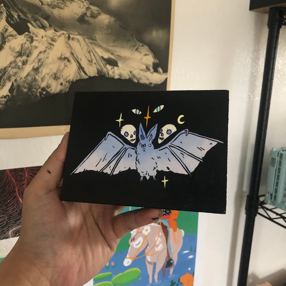 Image of Skulls with Bat Painting 